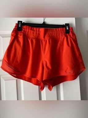 Lululemon Hotty Hot red-orange shorts. Size 12